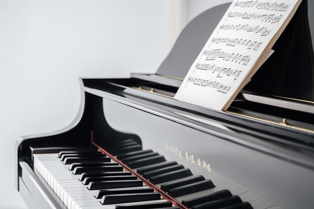 elegant grand piano with sheet music isolated white background close up ai generative