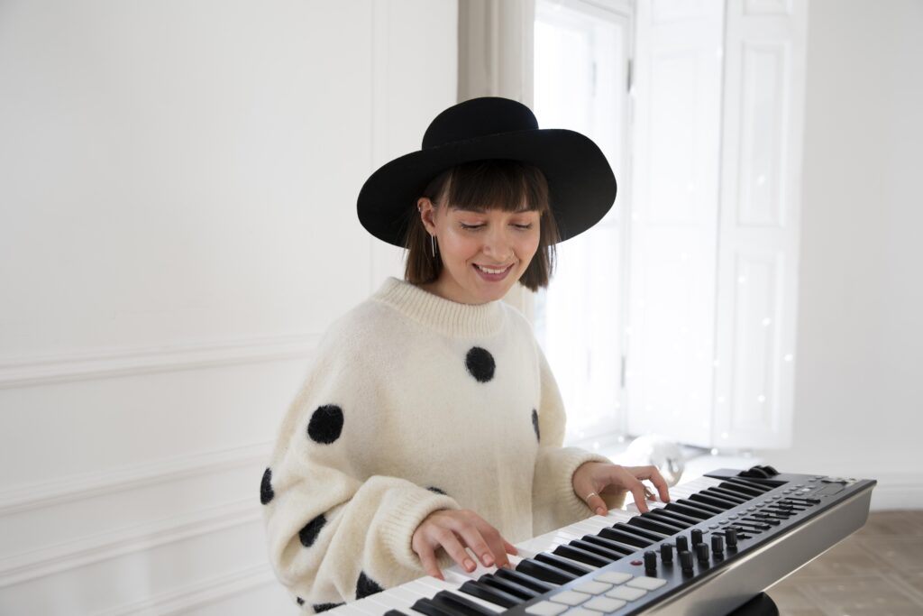 young-woman-playing-piano-indoors